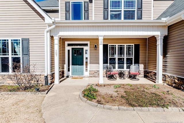 entrance to property with covered porch