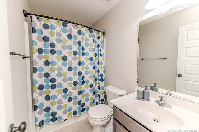 bathroom featuring tile patterned floors, vanity, toilet, and a shower with shower curtain