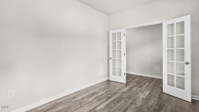 1009 Ocean Ct, Carthage, NC 28327 - empty room with french doors and wood finished floors