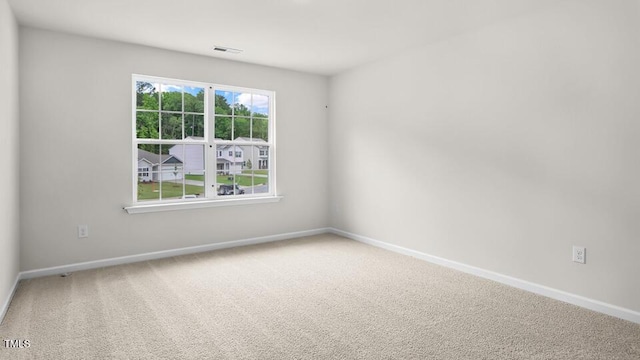 1009 Ocean Ct, Carthage, NC 28327 - unfurnished room featuring baseboards and carpet flooring