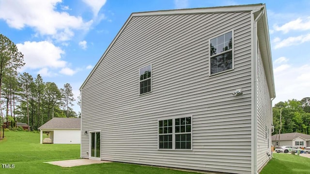 1009 Ocean Ct, Carthage, NC 28327 - rear view of property with a yard and a patio area