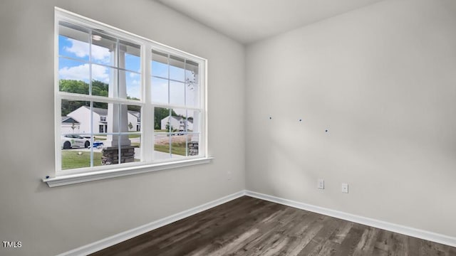 1009 Ocean Ct, Carthage, NC 28327 - unfurnished room with plenty of natural light and dark wood-type flooring