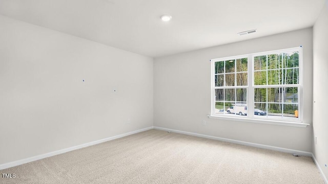 1009 Ocean Ct, Carthage, NC 28327 - unfurnished room featuring light carpet and baseboards