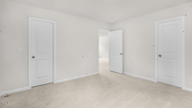 1009 Ocean Ct, Carthage, NC 28327 - unfurnished bedroom featuring light carpet and baseboards