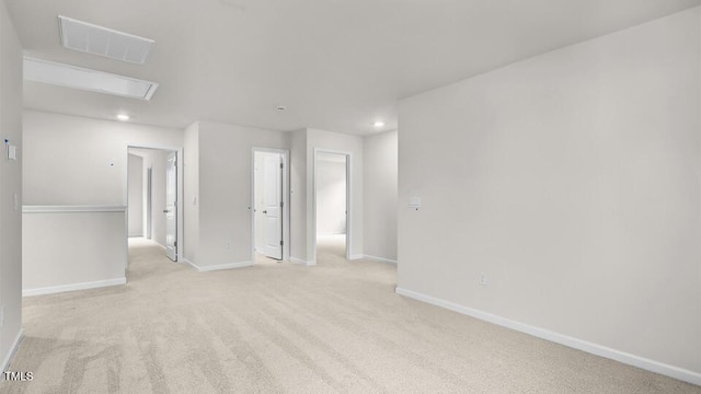 1009 Ocean Ct, Carthage, NC 28327 - spare room featuring attic access, recessed lighting, and light colored carpet
