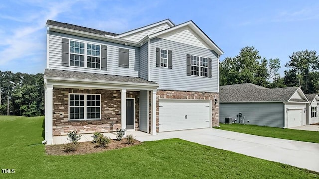 989 Ocean Ct, Carthage, NC 28327 - view of front of home with driveway, a front lawn, a garage, and stone siding
