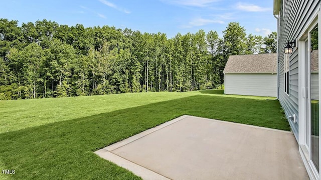 989 Ocean Ct, Carthage, NC 28327 - view of green lawn featuring a patio