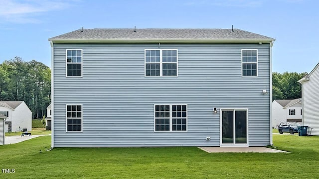 989 Ocean Ct, Carthage, NC 28327 - rear view of house featuring a lawn and a patio