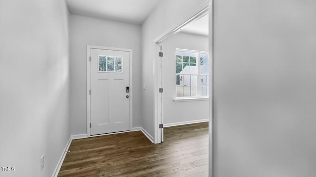 989 Ocean Ct, Carthage, NC 28327 - foyer entrance with dark wood-style flooring and baseboards