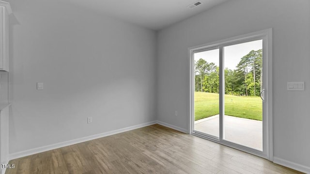 989 Ocean Ct, Carthage, NC 28327 - unfurnished room featuring wood finished floors and baseboards