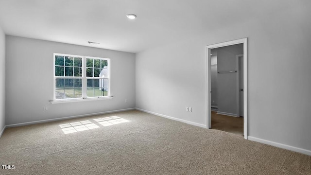 989 Ocean Ct, Carthage, NC 28327 - carpeted empty room featuring baseboards