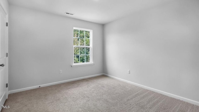 989 Ocean Ct, Carthage, NC 28327 - carpeted empty room featuring baseboards