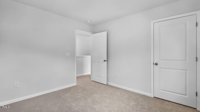 989 Ocean Ct, Carthage, NC 28327 - unfurnished bedroom featuring carpet floors and baseboards