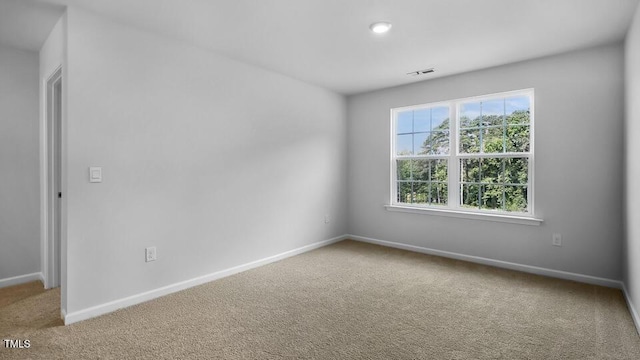 989 Ocean Ct, Carthage, NC 28327 - carpeted empty room with baseboards