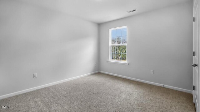 989 Ocean Ct, Carthage, NC 28327 - spare room featuring carpet floors