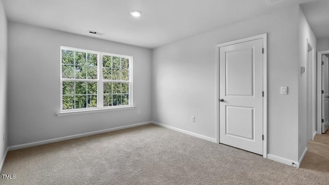 989 Ocean Ct, Carthage, NC 28327 - unfurnished bedroom with carpet and baseboards
