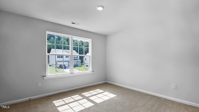 989 Ocean Ct, Carthage, NC 28327 - carpeted spare room featuring plenty of natural light