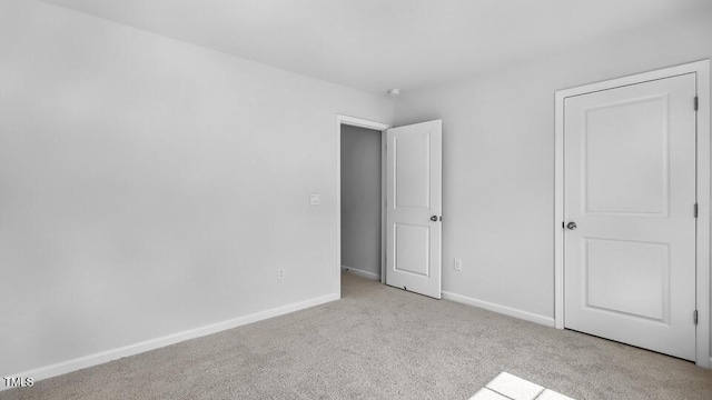 989 Ocean Ct, Carthage, NC 28327 - unfurnished bedroom with carpet and baseboards