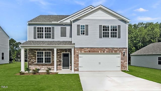 989 Ocean Ct, Carthage, NC 28327 - view of front of home featuring a front lawn, driveway, a garage, a shingled roof, and brick siding