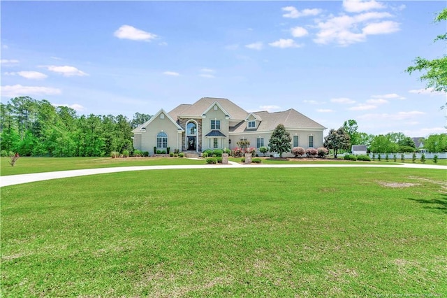 view of front of home with a front lawn