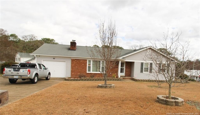 single story home featuring a garage