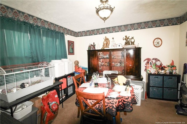 dining area featuring carpet floors