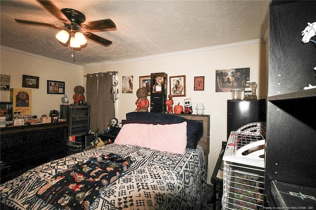 bedroom with crown molding, ceiling fan, and a textured ceiling