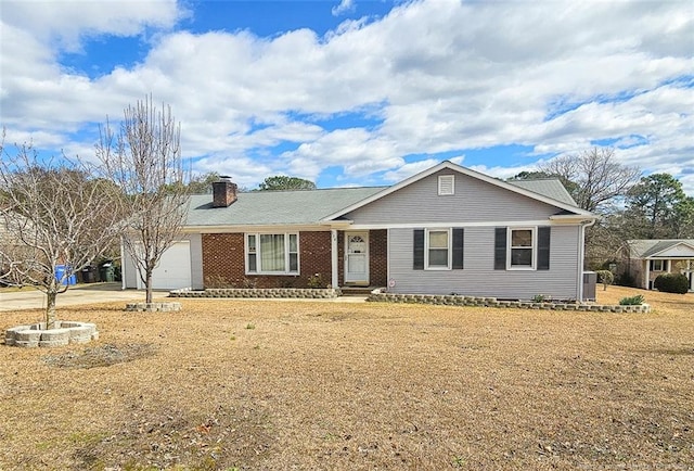 ranch-style home featuring concrete driveway, a chimney, an attached garage, cooling unit, and brick siding