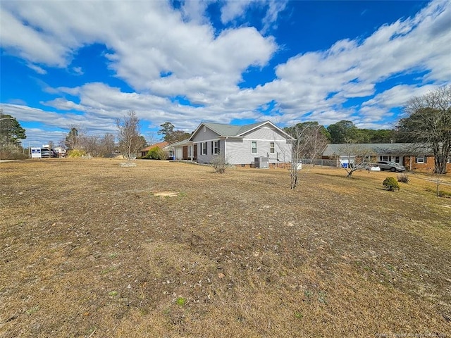 exterior space with a yard