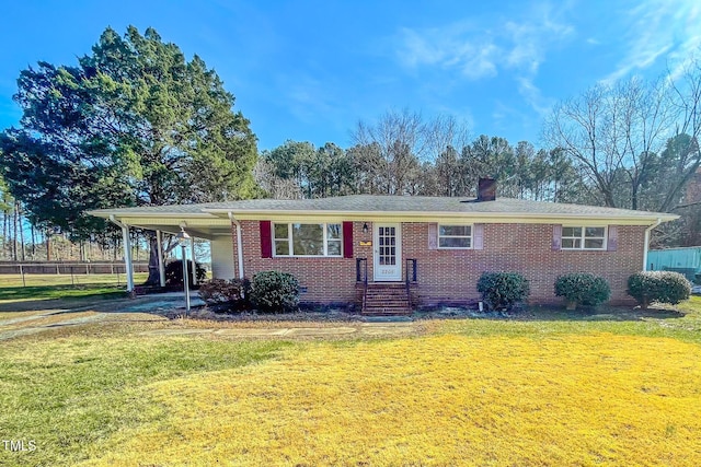 single story home with a carport and a front yard