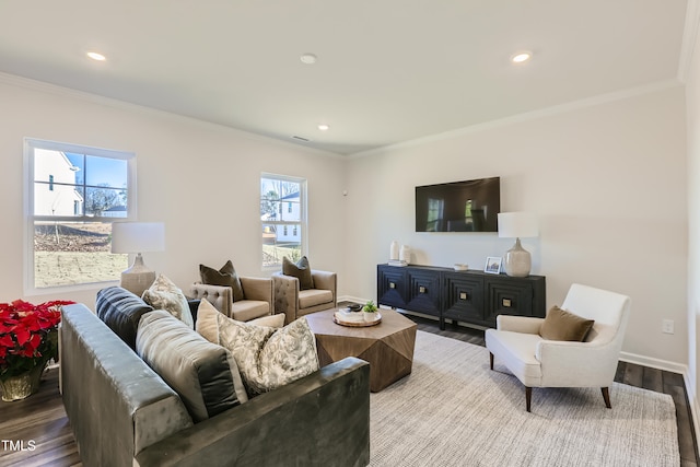 living room featuring light hardwood / wood-style flooring and ornamental molding