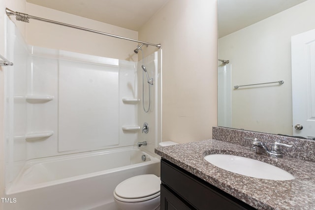 bathroom with shower / bath combination, vanity, and toilet