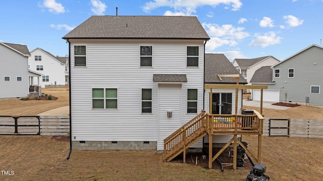 40 Long Needle Ct, Youngsville, NC 27596 - back of house with a fenced backyard, crawl space, a shingled roof, and a wooden deck