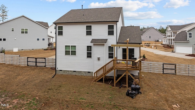 40 Long Needle Ct, Youngsville, NC 27596 - rear view of house featuring stairs, a wooden deck, a fenced backyard, crawl space, and a shingled roof