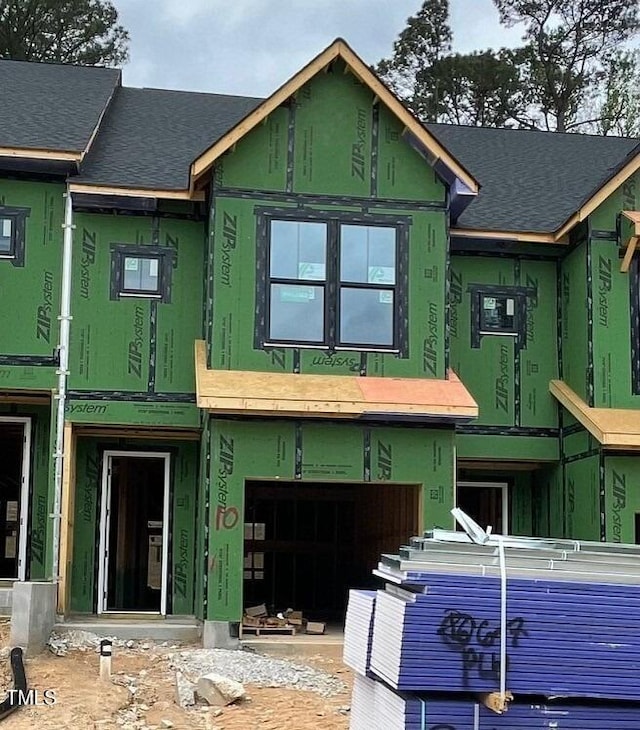property under construction featuring a garage
