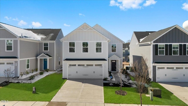 view of front of home featuring driveway, a front lawn, and board and batten siding