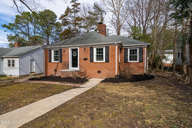 bungalow-style home featuring a front yard