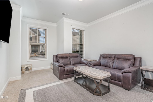 living area featuring carpet floors, visible vents, ornamental molding, and baseboards