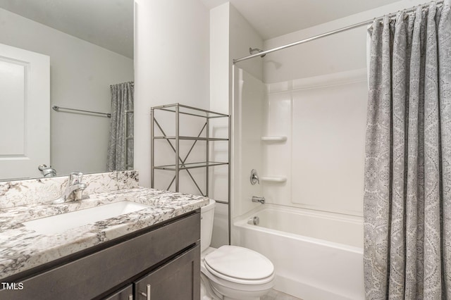 full bathroom with shower / tub combo, vanity, and toilet