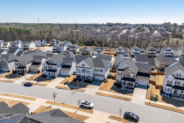 birds eye view of property with a residential view