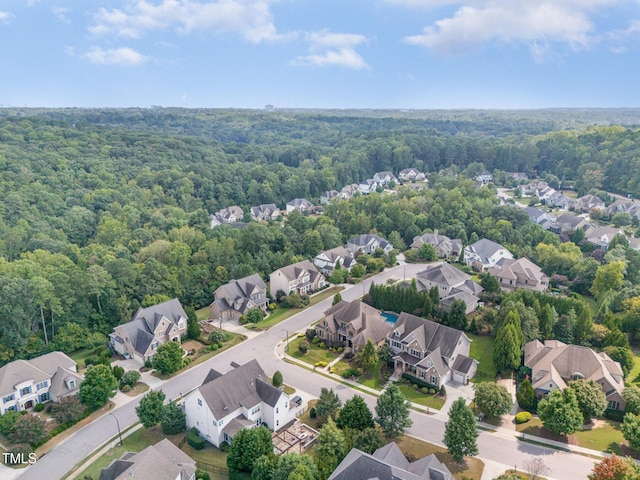 aerial view with a residential view and a forest view