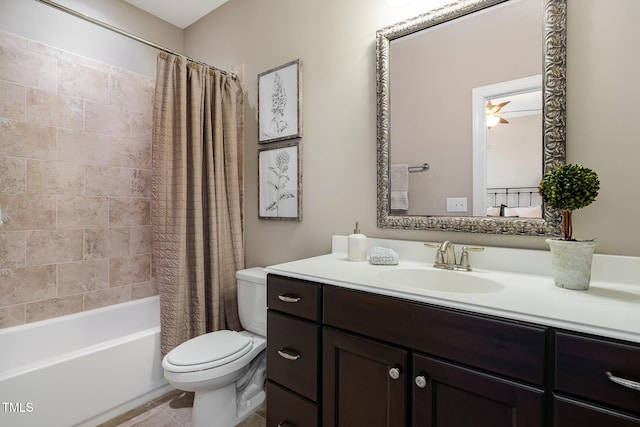 bathroom with toilet, shower / bath combo, vanity, and tile patterned flooring