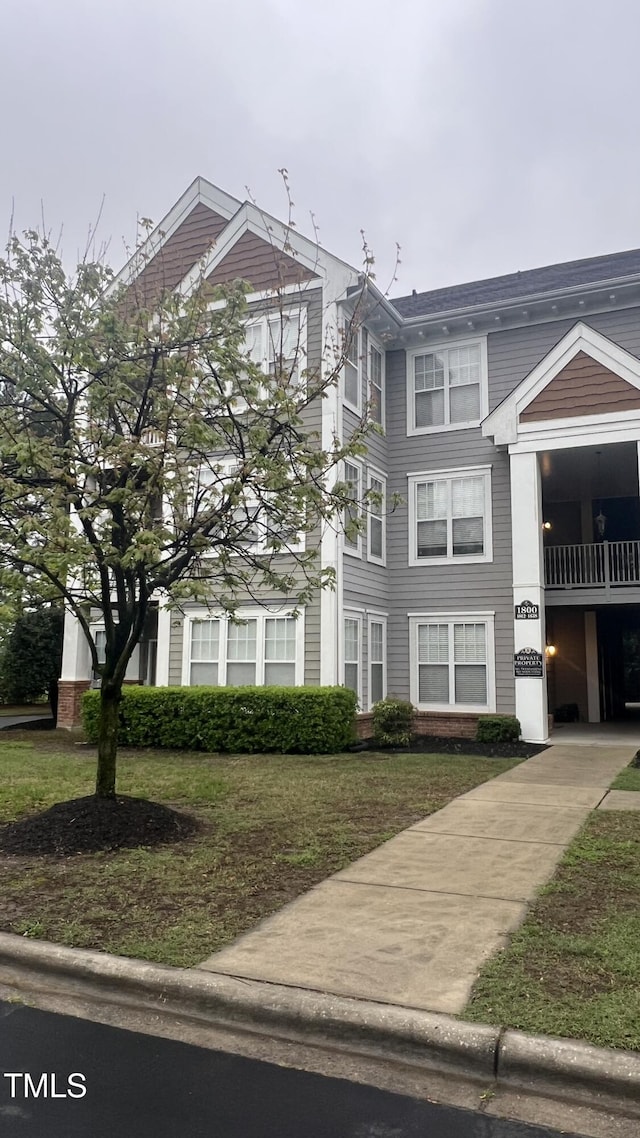 1828 Parkside Village Dr, Clayton, NC 27520 - view of front facade featuring a front yard