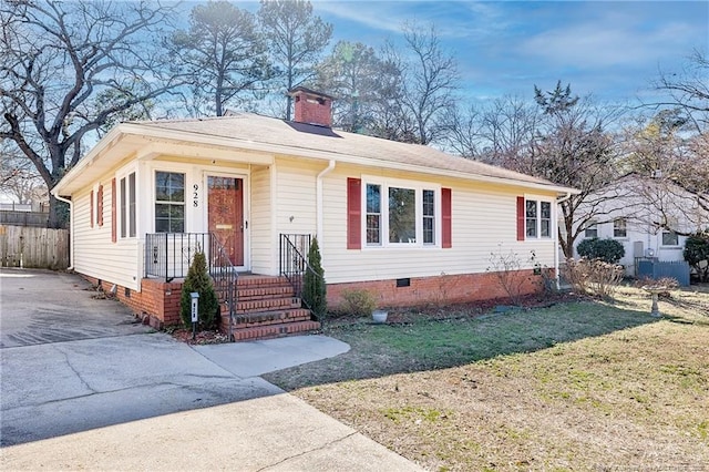 ranch-style house featuring a front yard