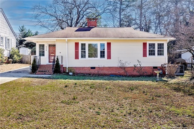 view of front of home featuring a front yard