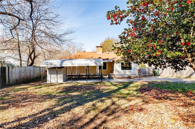 back of house featuring a patio area