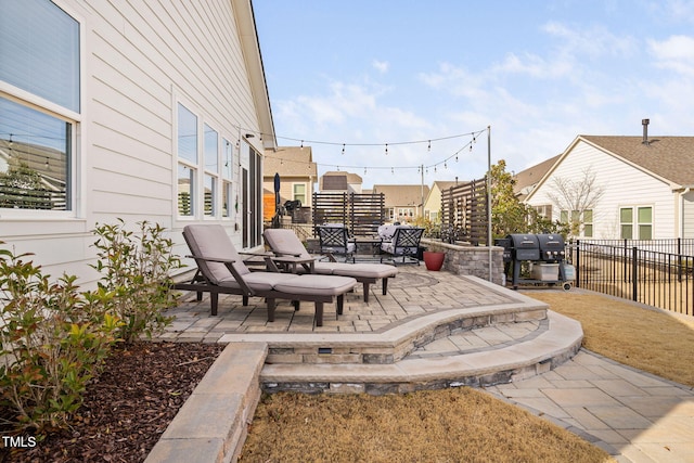 view of patio featuring fence