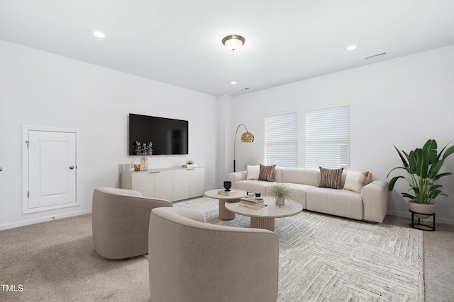 living area with carpet floors, visible vents, baseboards, and recessed lighting