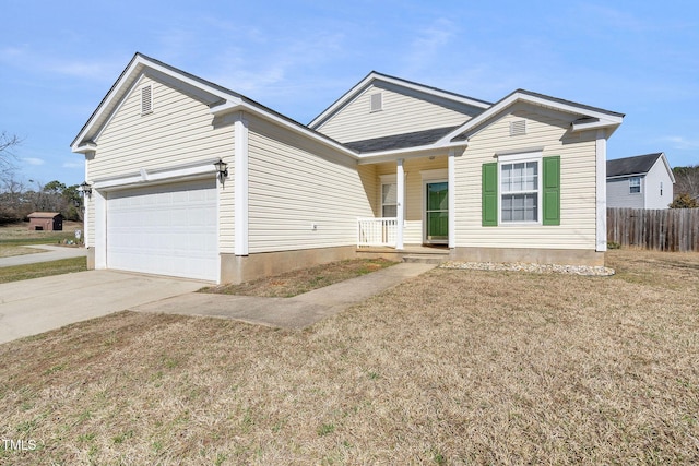 view of front of home featuring a garage and a front lawn