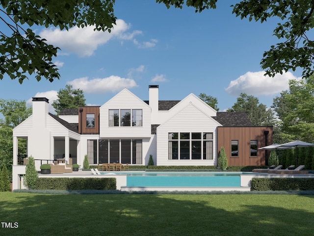 back of property featuring a patio, a chimney, and a lawn